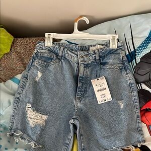 Denim Blue Ripped Brand new Zara denim size 6.